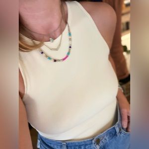 Layered necklace w/ turquoise & colored beads. Perfect for casual or date nights